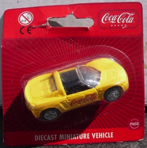 01023-11 € 3,50 coca cola auto geel ( 1x zonder doosje)
